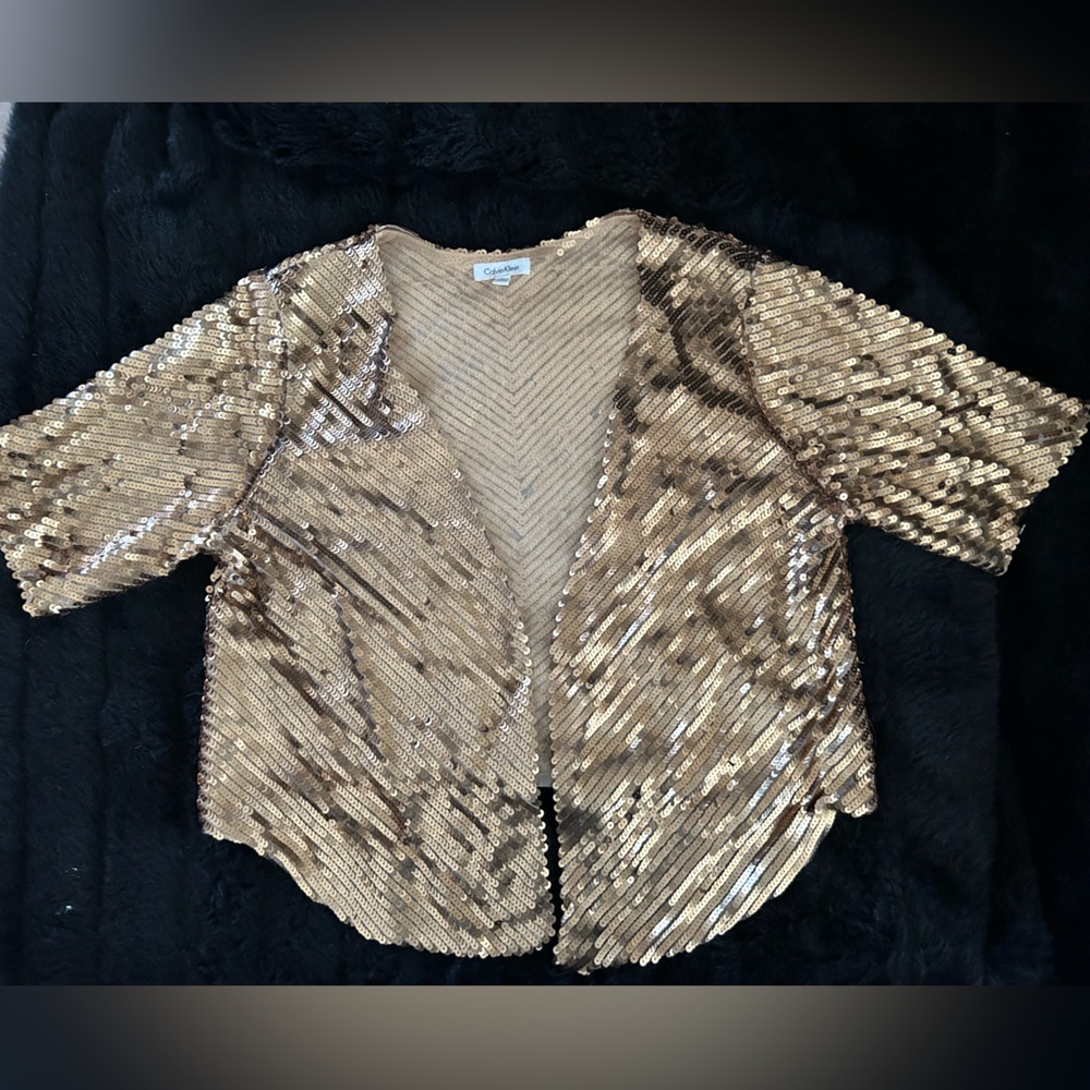 Ladies Calvin Klein top with sequins size large never been worn